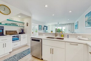 Fridge, microwave, oven, stovetop - Coastal home with large deck, close to beach and local attractions (Holden Beach)