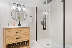 Shower, towels - Waterfront home with wrap-around deck, two blocks from ocean (Holden Beach)