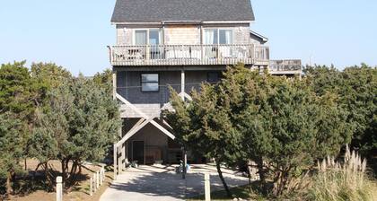 Fun home with ocean view, washer/dryer, outdoor pool access, and private hot tub