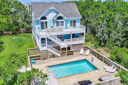 Incredible two-story home with private pool, hot tub, & game room