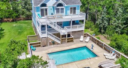 Incredible two-story home with private pool, hot tub, & game room