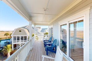 Terrace/patio - Beach Hunters- Spacious newly built coastal home with scenic views, private pool & Tiki Bar (Holden Beach)