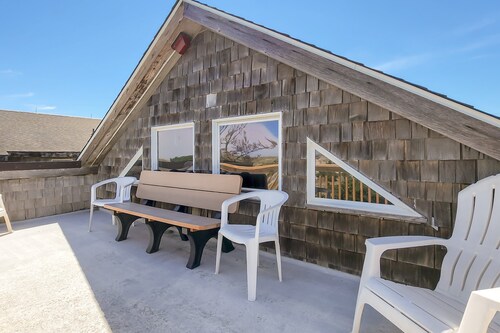 OBX beach house with ocean views, decks, private hot tub, & seasonal pool access