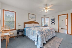 A bedroom with a bed, a desk, a chair, a ceiling fan, and a window. - As Good As It Gets: Dog-Friendly, Private Hot Tub, Shared Pool & Views (Avon)