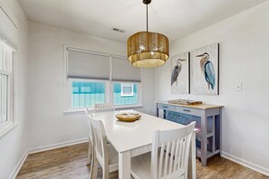 Dining - Stunning marsh view home with fire-pit and close to beach access (Oak Island)