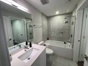 Shower, hair dryer - Downtown, bright, cozy & modern 1 Bedroom (Halifax)