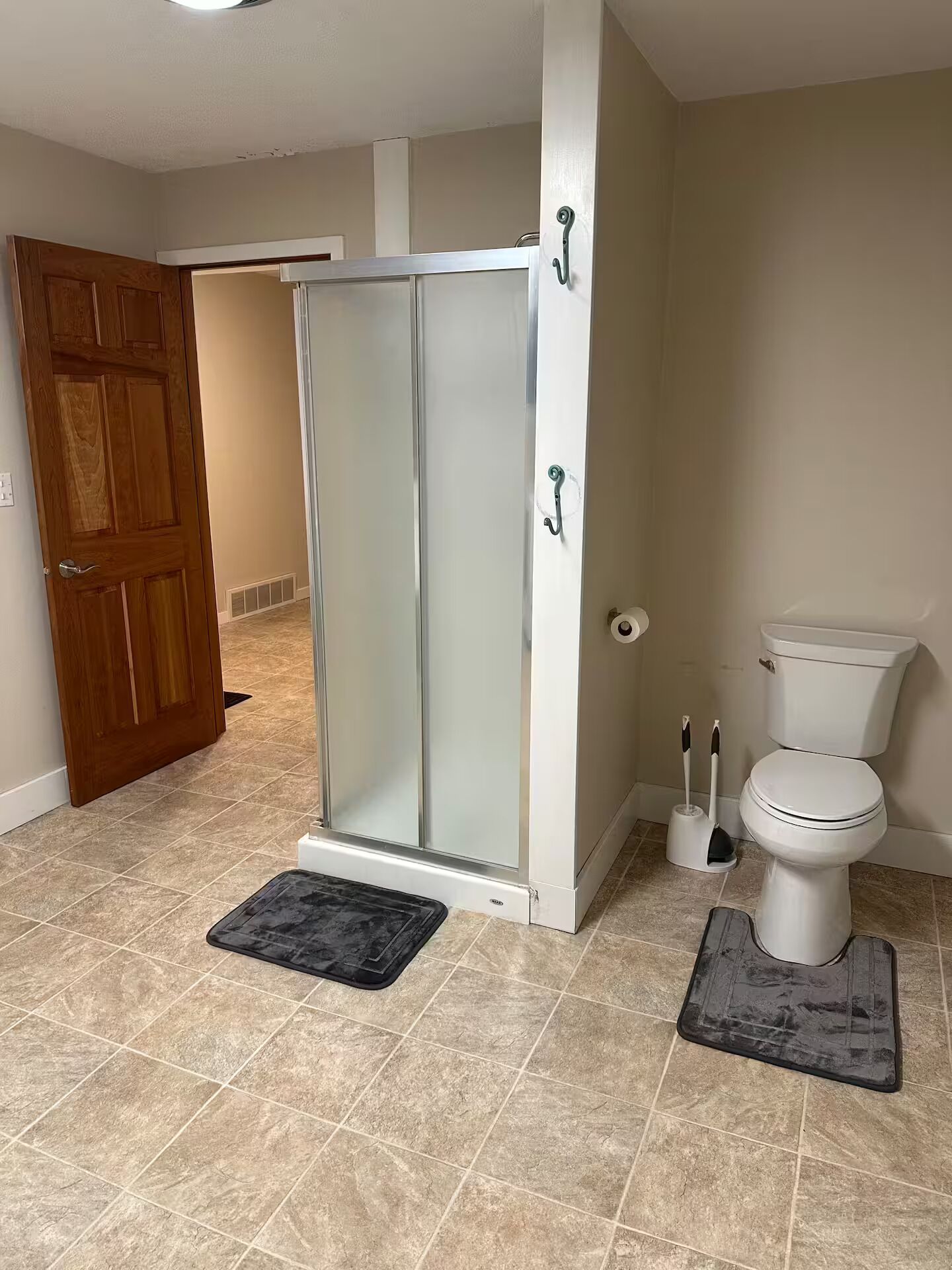 Shower, towels, soap, toilet paper