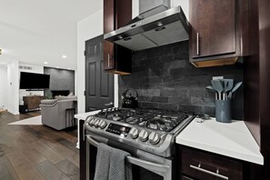 Coffee/tea maker, fridge, microwave, oven