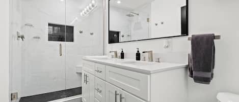 Shower, hair dryer, towels, soap