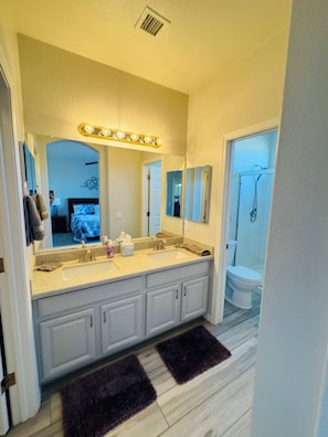 Shower, towels, toilet paper