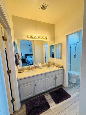 Shower, towels, toilet paper