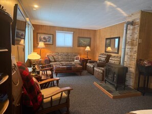 TV, fireplace - Lake Chippewa Flowage Stunning View 2-BR private home & dock, A/C, washer, dryer (Hayward)