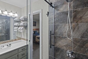 Shower, hair dryer, towels