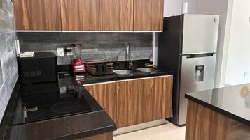 Fridge, microwave, stovetop, cookware/dishes/utensils