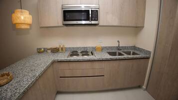 Fridge, microwave, stovetop, cookware/dishes/utensils