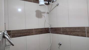 Toalhas de banho, papel higiênico