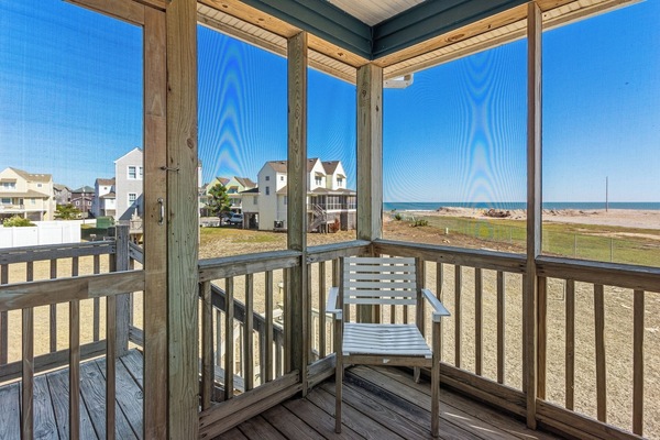 Sip your morning coffee or unwind in the evening breeze from the screened-in porch, where tranquil water views and the sounds of nature create the perfect Outer Banks retreat.