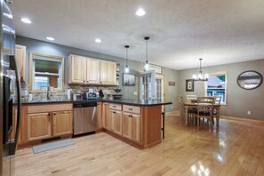 Fridge, microwave, oven, stovetop - Renovated Mountain Chalet - Hot Tub, Pool Table, Dog Friendly @ Deep Creek Lake (McHenry)