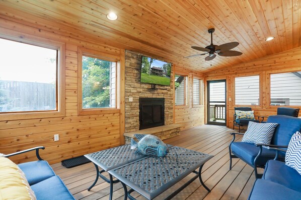 Smart TV, fireplace, books