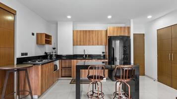 Fridge, microwave, dining tables