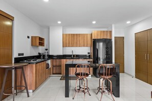 Fridge, microwave, dining tables