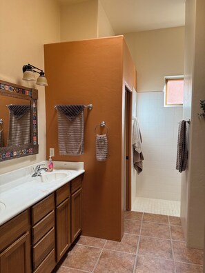 Shower, hair dryer, towels, soap