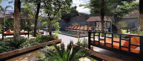 Outdoor pool, open 9:00 AM to 9:00 PM, free cabanas, pool umbrellas