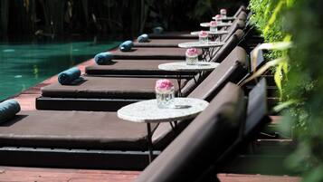 Outdoor pool, open 9:00 AM to 9:00 PM, free cabanas, pool umbrellas
