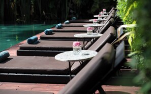 Outdoor pool, open 9:00 AM to 9:00 PM, free cabanas, pool umbrellas