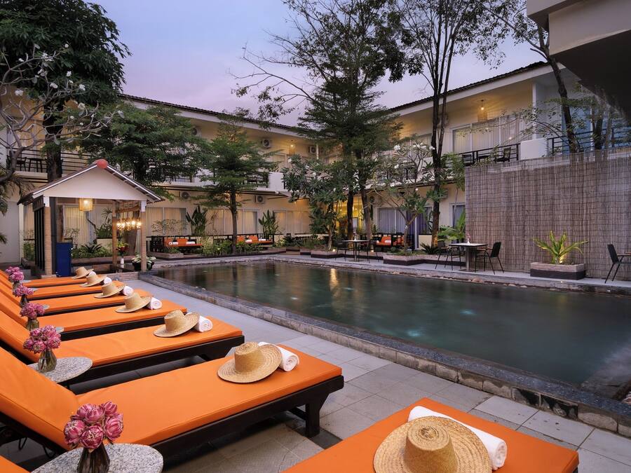 Outdoor pool, open 9:00 AM to 9:00 PM, free cabanas, pool umbrellas
