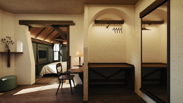 A cozy room with a wooden ceiling, a bed, a desk with a chair, a hanging coat rack, and a large window. - Banla Boutique Hotel (Lam Vien - Da Lat)