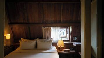 Attic Deluxe Room | Minibar, in-room safe, blackout curtains, free WiFi