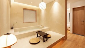 Habitación Deluxe con 2 camas individuales | Área de sala de estar