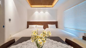 Family Room | Premium bedding, down comforters, memory foam beds, free WiFi