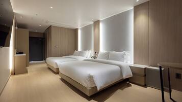 Blackout drapes, soundproofing, free WiFi, bed sheets