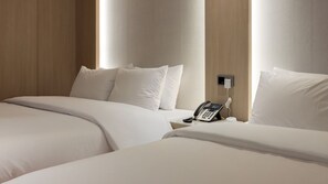 Blackout drapes, soundproofing, free WiFi, bed sheets