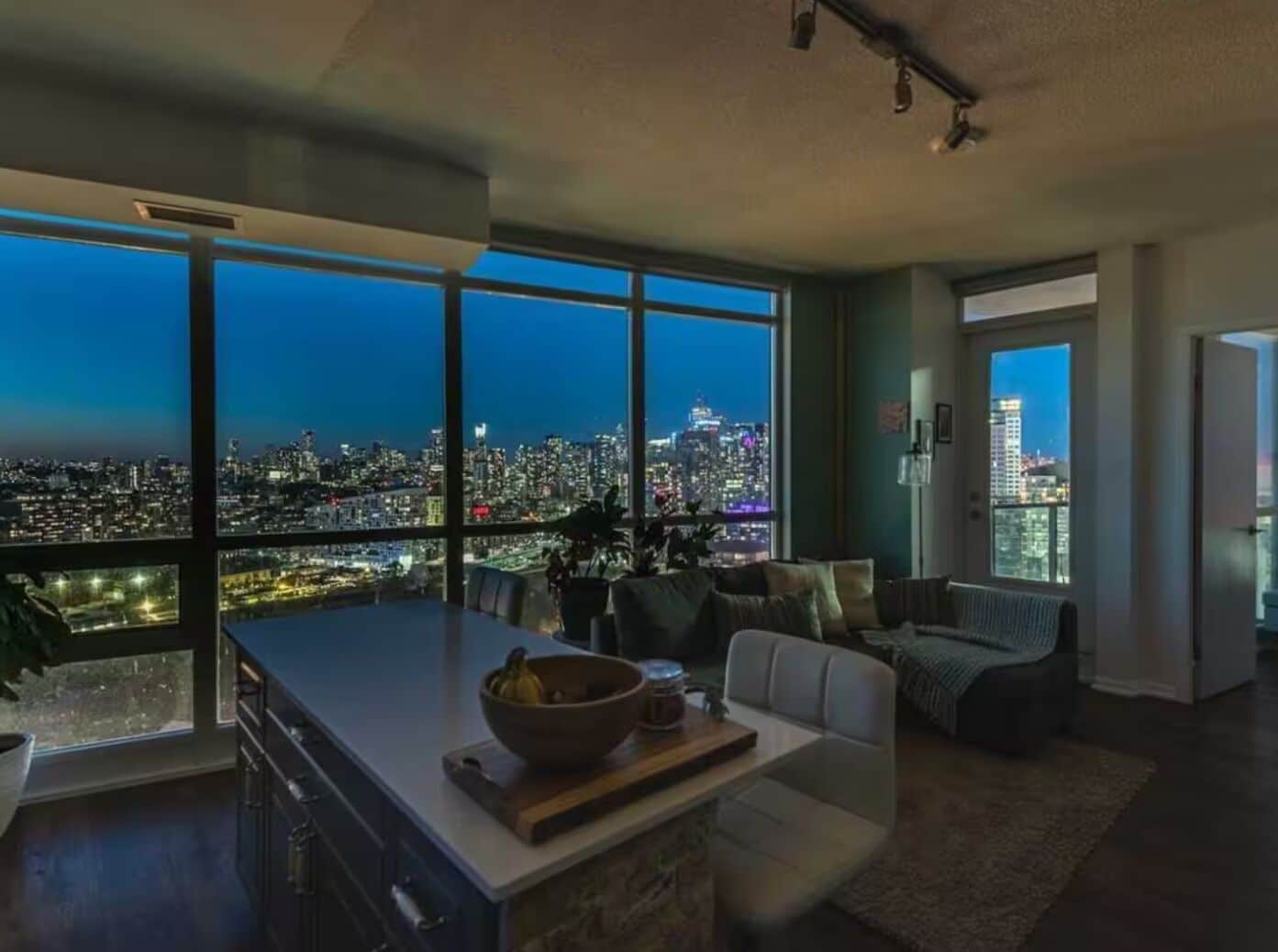 Honeymoon Apartment | Living area | 65-inch flat-screen TV with cable channels