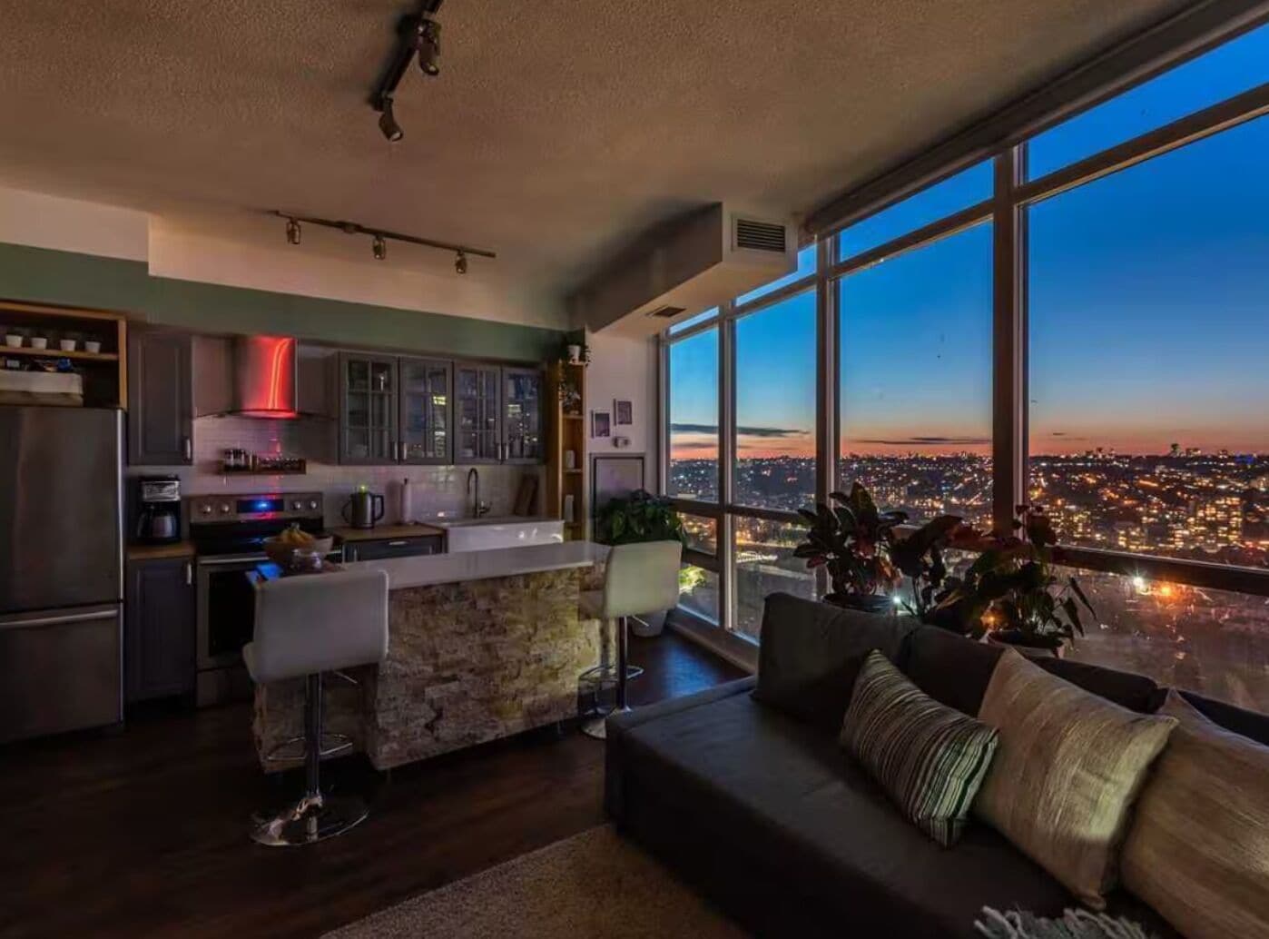 Design Apartment | Living area | 65-inch flat-screen TV with cable channels