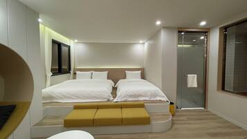 Family Room | Premium bedding, memory-foam beds, free minibar, laptop workspace