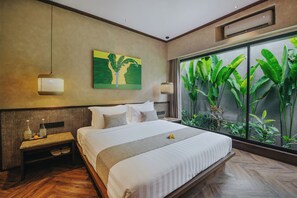 Luxe kamer, 1 queensize bed, uitzicht op tuin | Luxe beddengoed, een minibar, een bureau, een laptopwerkplek