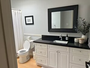 Hair dryer, towels, soap, toilet paper