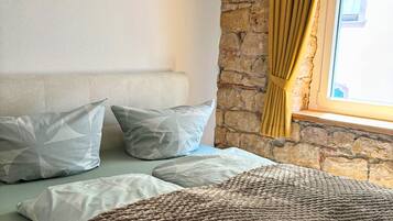 Apartemen | 2 kamar tidur, setrika/meja setrika, dan seprai linen