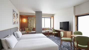 Deluxe Twin Room, Garden View | Desk, laptop workspace, free WiFi