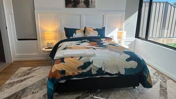 2 bedrooms, desk, iron/ironing board, travel cot