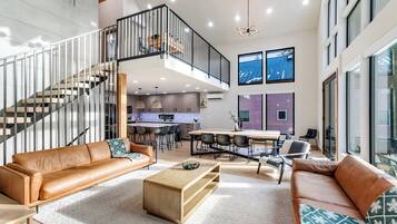 Smart TV, fireplace, foosball, books
