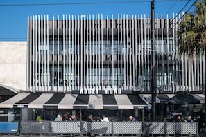 A modern building with a sign reading "Abbey Road." - Stylish Retreat with St.Kilda Action at Your Door (Port Phillip)