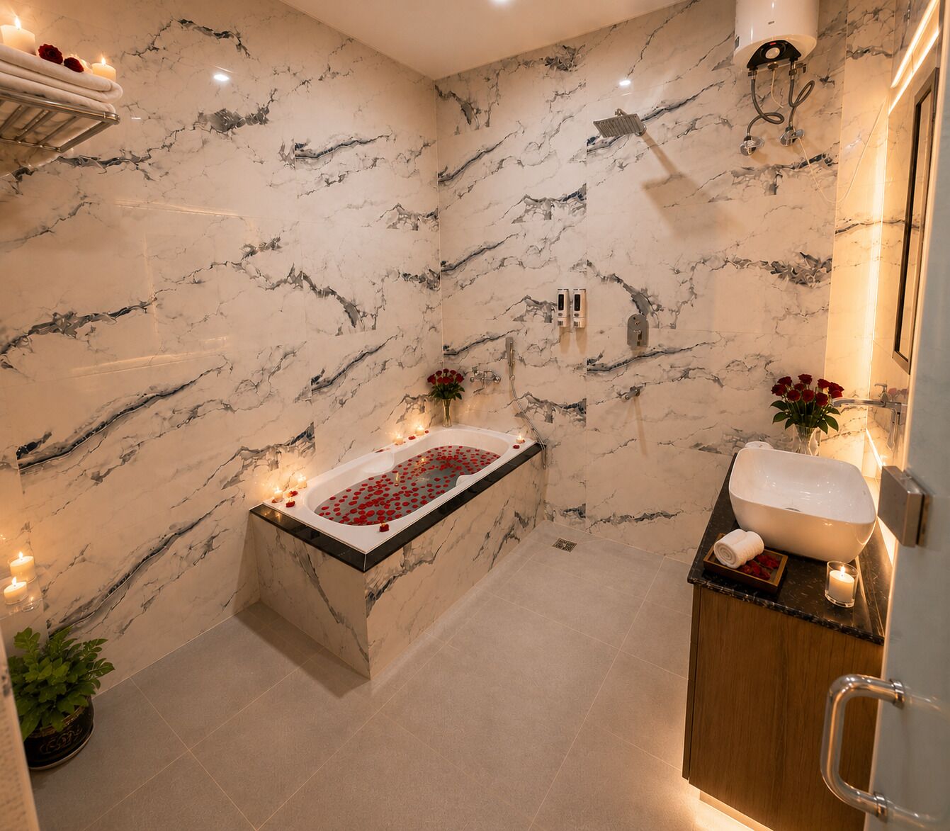 Un baño con pared de mármol, una bañera, un lavabo y zona de ducha.
