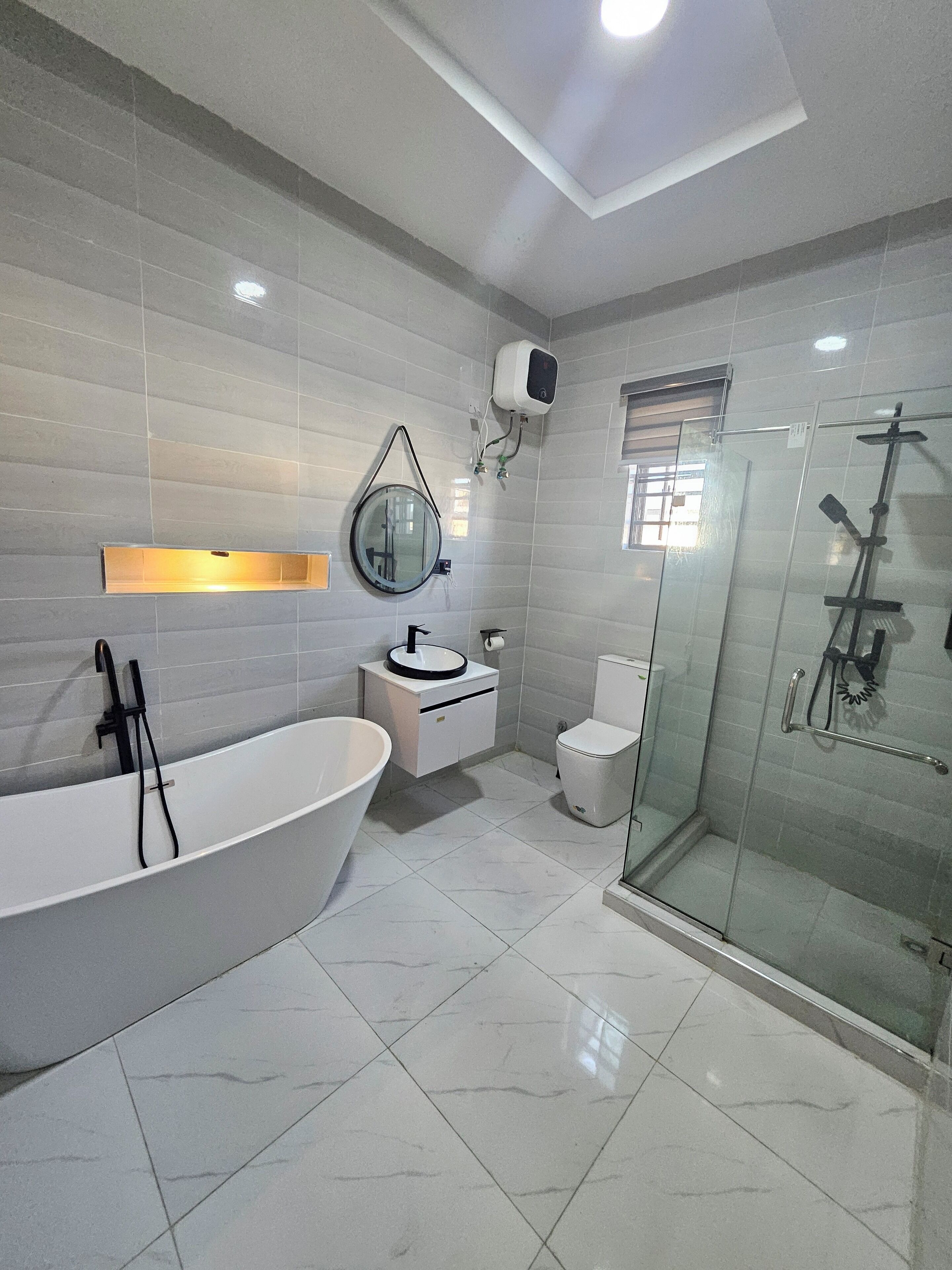 Shower, towels, soap, toilet paper