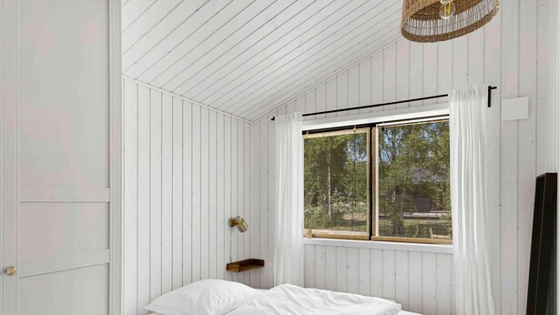 A bedroom with a bed, a window with curtains, a wooden nightstand, and a hanging light fixture. - 5 Star Holiday Home in Hasle (Nykobing Sjaelland)