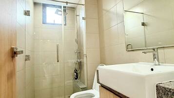 Hair dryer, towels, soap, toilet paper